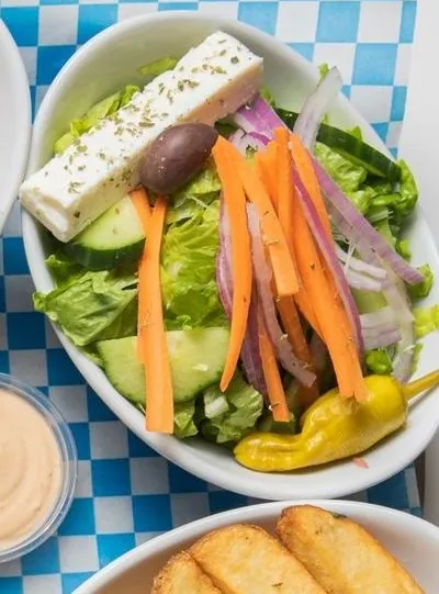 Greek salad with feta, carrots and pepperoncini