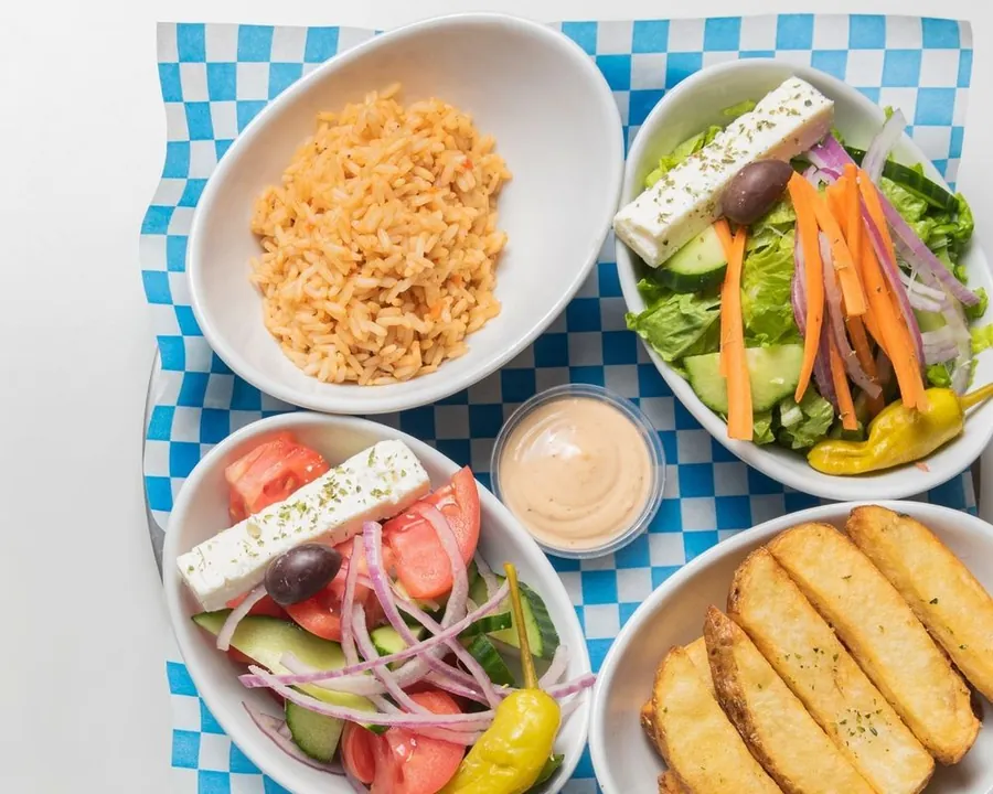 Greek salads, rice, lemon potatoes and house mayo